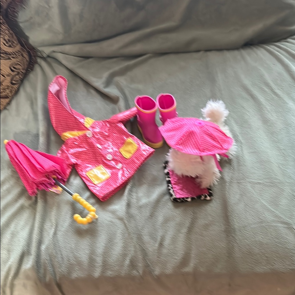 Pink and Yellow Doll Raincoat Set plus outfits pictured